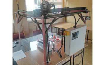 Stanowisko dydaktyczne - robot kartezjański z taśmowym systemem transportowym